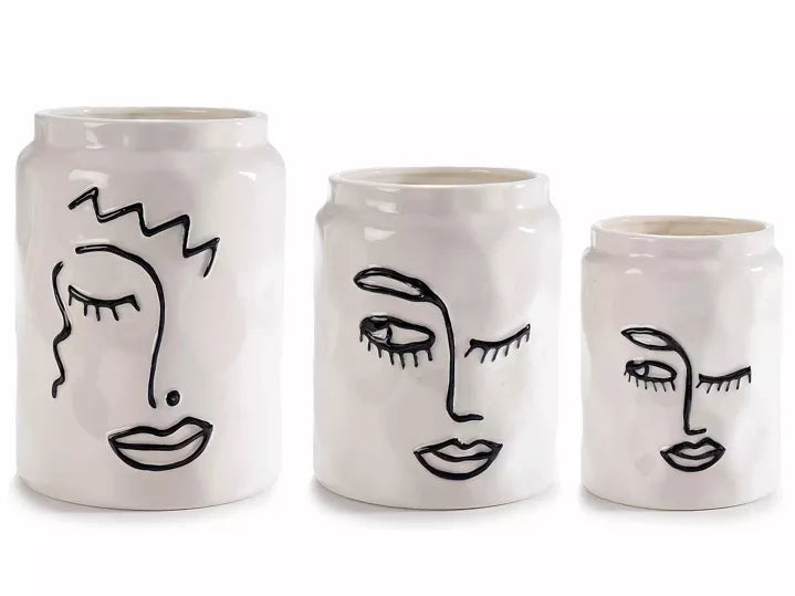 Ensemble de vases en porcelaine avec visage de femme