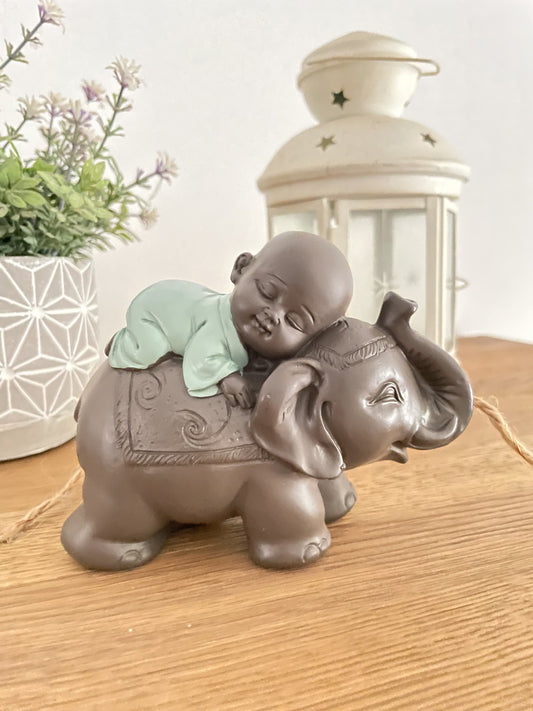 Bébé Bonze sur son éléphant
