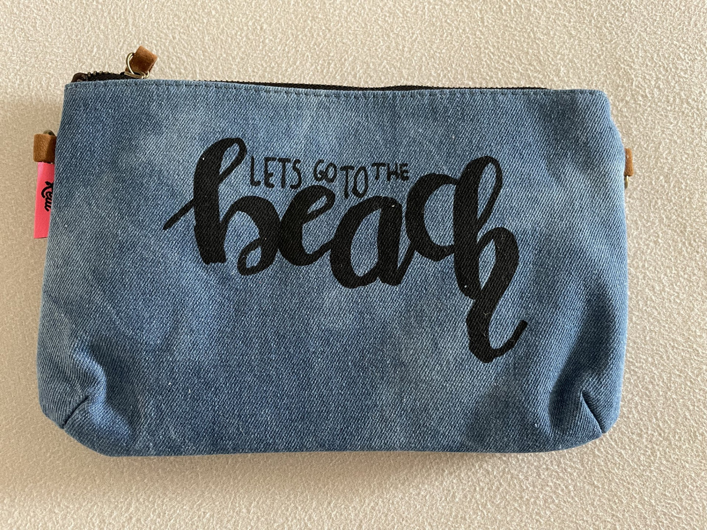 Sac pochette en jeans et sa bandoulière chaine amovible